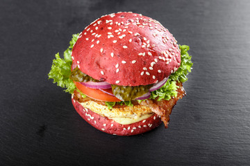 red burger on the table