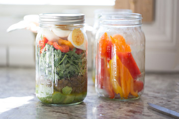 Fototapeta na wymiar salad in glass jar