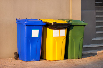 Trash can, garbage bin, recycling bin in tourist complex resort, waiting to be picked up by garbage...