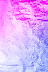 Purple and blue foil abstract background in trending neon colors