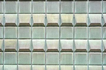 Background from plates with a copper greenish tint. Brass rectangular tiles.