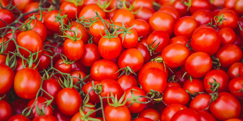 Ripe tomatoes on the counter.