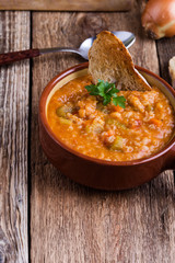 Healthy vegetarian barley soup with seasonal vegetables