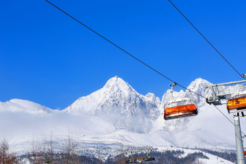 Fototapeta premium Chair lifts on the mountains
