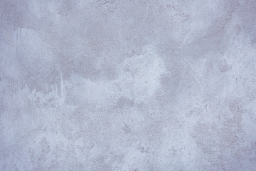 The texture of the old cement wall with scratches, cracks, dust, crevices, roughness, stucco. Can be used as a poster or background for design.