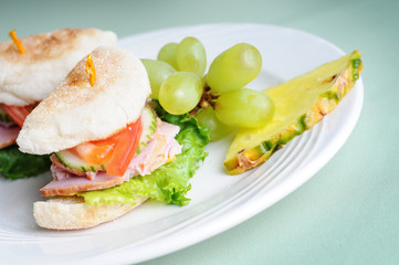 Ham Sandwich on English Muffin with Fresh Fruit - Healthy Eating Diet Food