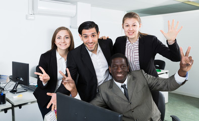 Positive business group enjoying their success