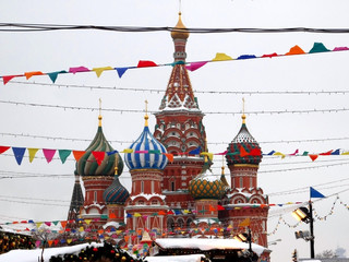Moscow, Russia - January 31, 2019: Saint Basil's Cathedral covered with snow in Red Square. The view from the GUM fair