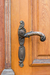 Obraz premium Vintage antique door handle on the old wooden door, Old Door knob
