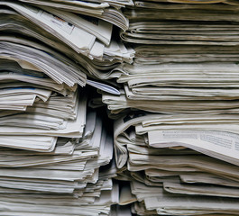 stack of newspapers background
