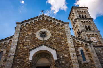 Fototapeta na wymiar Front facade of the Church of San Salvatore located in the historic center of Castellina in Chianti in Tuscany, Italy
