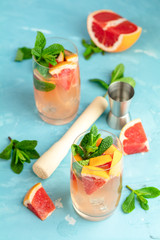 Grapefruit and fresh mint cocktail with juice