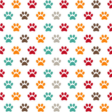 Seamless pattern with colorful animal foot prints, paws