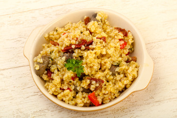 Bulgur with chicken hearts
