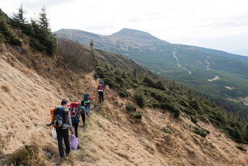 Fototapeta na wymiar Hiking group of tourists in the mountains.