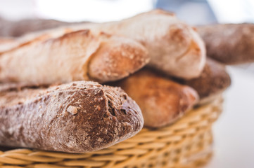 Basket full of whole grain roll breads