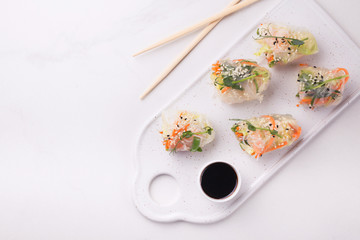 Vietnamese spring rolls with shrimps and vegetables. Copyspace