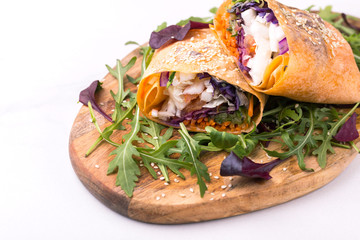 Healthy vegan fried vegetable wrap. raw food concept