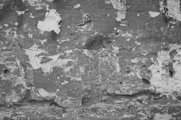 The texture of the old cement wall with scratches, cracks, dust, crevices, roughness, stucco. Can be used as a poster or background for design.