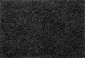 A close up of Black felt material background.