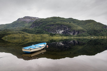 View of a Norwegian lake with a boat