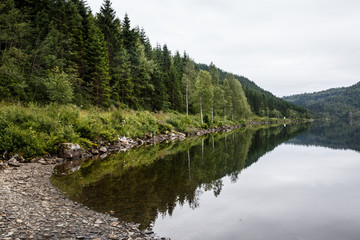 View of a Norwegian lake with reflection