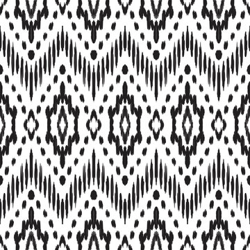 Black and white seamless background. Ethnic ikat ornament. Vector illustration. Tribal pattern. Can be used for textile, wallpaper, wrapping paper, greeting card backdrop, print.