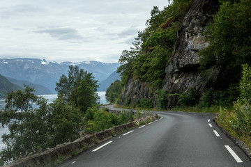 Curvy road in Norway along the fjord