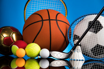 Sport equipment and balls, stadium background