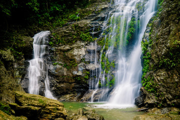 waterfall in the forest on the island of Mindoro, the Philippines