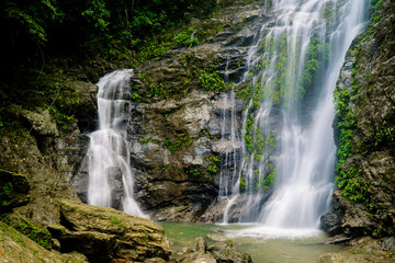 Fototapeta na wymiar waterfall in the forest on the island of Mindoro, the Philippines