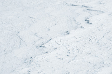 Fresh snow background texture. Winter background with snowflakes and snow mounds. Snow lumps.
