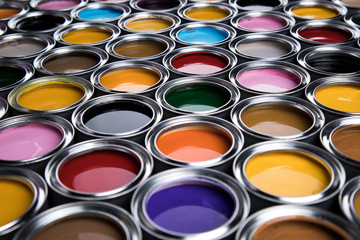 Group of tin metal cans with color paint