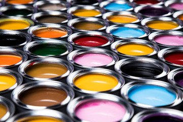 Full Buckets of rainbow colored oil paint