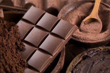 Chocolate bar, candy sweet, cacao beans and powder
