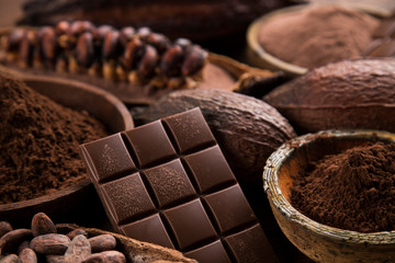 Chocolate bar, candy sweet, cacao beans and powder