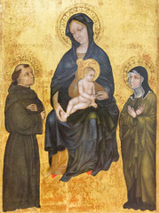 Pavia, Italy. November 11 2017. The painting of Madonna with the infant Jesus among Saint Francis of Assisi and Saint Clare. End of XIV century. From the convent "Santa Chiara la Reale" in Pavia. © Adam Ján Figeľ