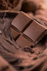 Cocoa beans and chocolate on natural paper background