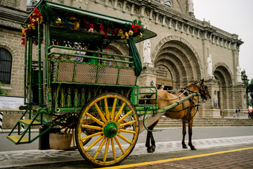Horse Drawn Carriage parking in front of Malate church , Manila Philippines - 258204171