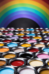 Full Buckets of rainbow colored oil paint