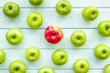 summer fruit pattern with apples on light wooden background top view copyspace