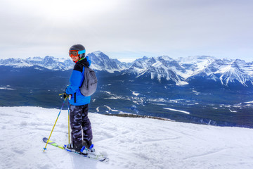 Young Skier on Mountain Edge at Lake Louise in the Canadian Rockies