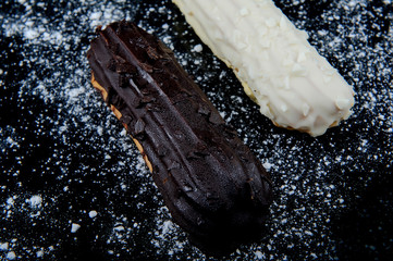 Eclair on black background