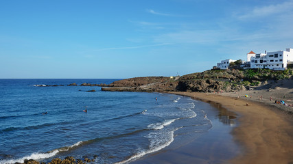 Playa Poris de Abona, a small beach in the south-eastern part of island of Tenerife with sunny sky and great temperatures, favored by the European tourists in the winter, cold season, Canary Islands