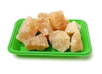 dark crystal sugar on white background