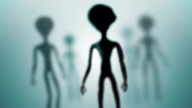 Scary blurred silhouettes of moving aliens. Looping animation.