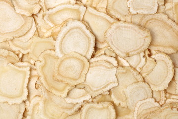 Chinese Herbal medicine - American Ginseng slices (Panax quinquefolius) isolated on white background