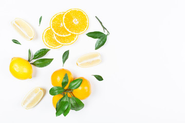 Lemon, mandarin with leaves isolated on white background. Flat lay, top view. Fruit composition