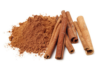 Cinnamon Sticks and Ground Cinnamon on a white background