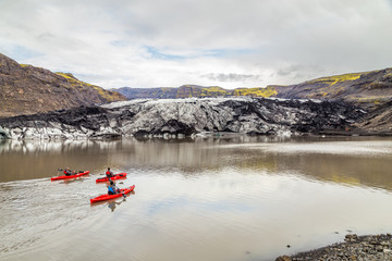 Kayaks on trip around glacier, Iceland